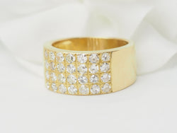 Yellow gold and diamond ribbon ring 