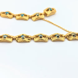 Bracelet en or jaune et turquoises