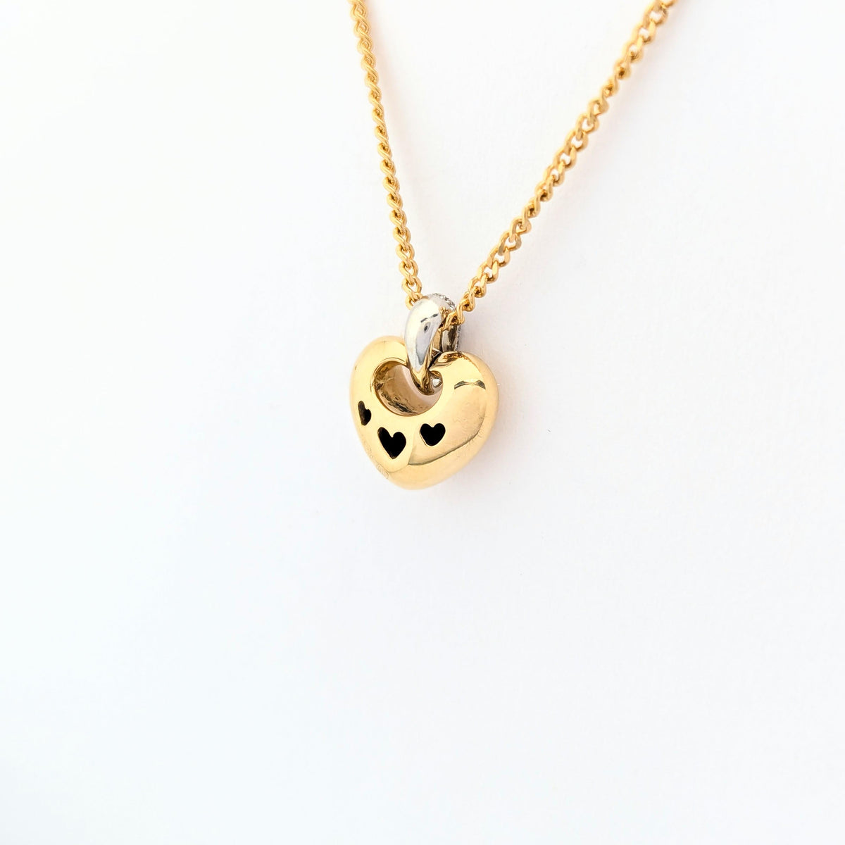 Collier coeur en or jaune et diamants