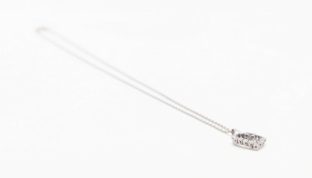 Collier maille forçat en or blanc et diamant