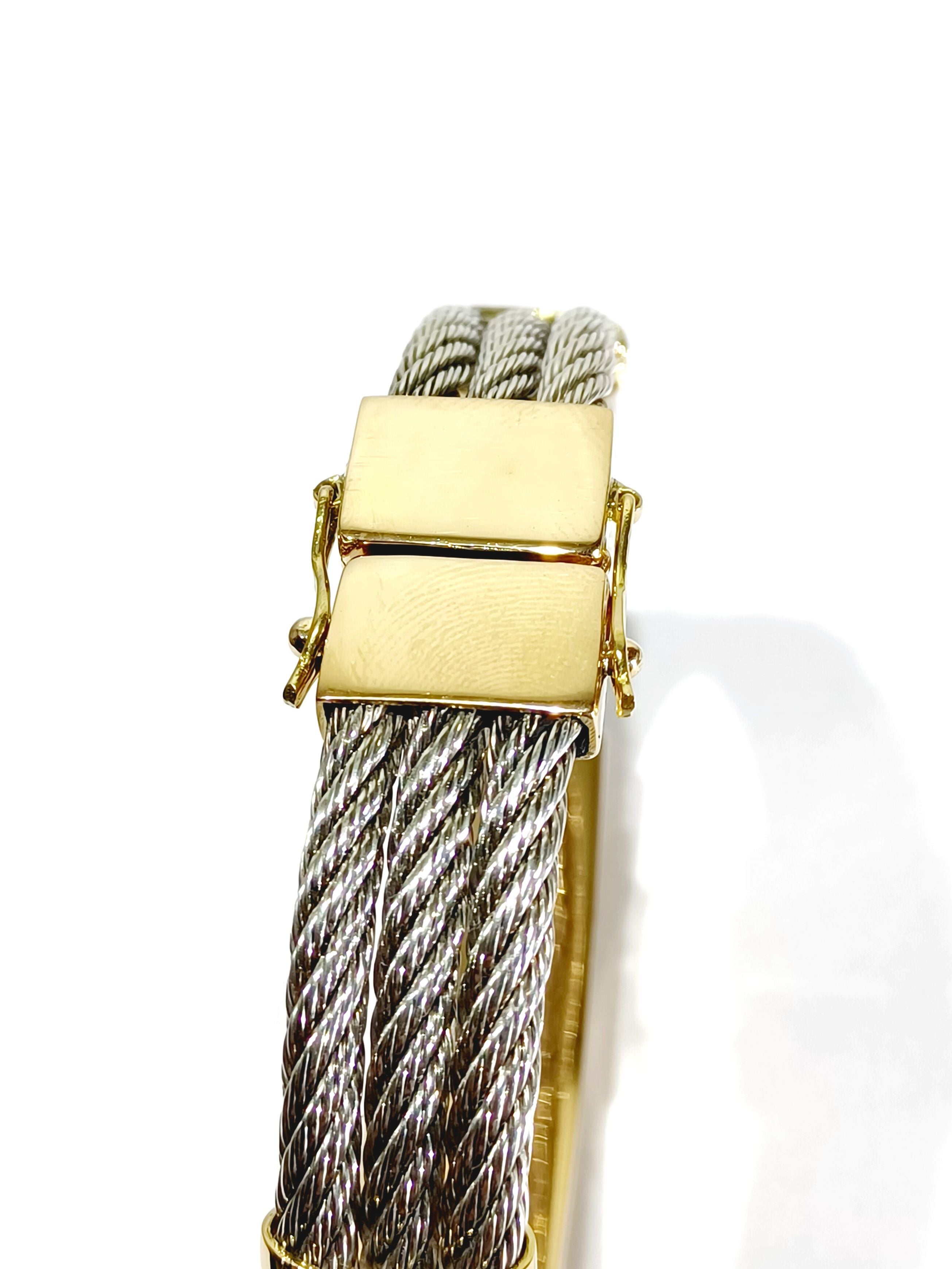 Bracelet at yellow gold and silver