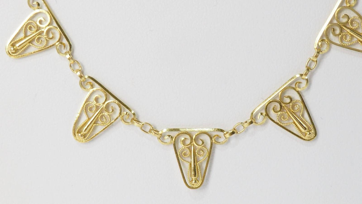 Filigree gold drapery necklace 