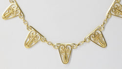 Collier draperie en or filigrané