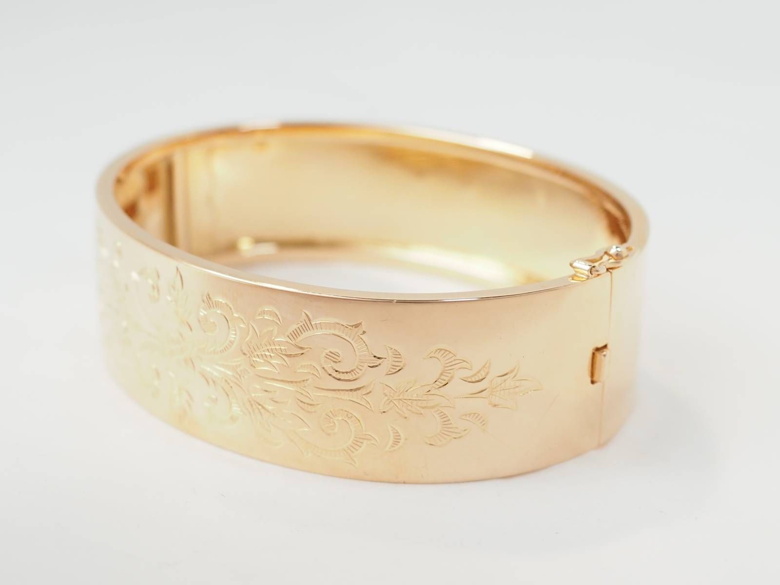 Bracelet jonc décor floral en or rose