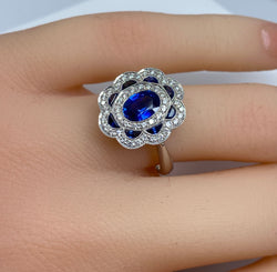 Bague marguerite en or 18 carats en saphirs et diamants