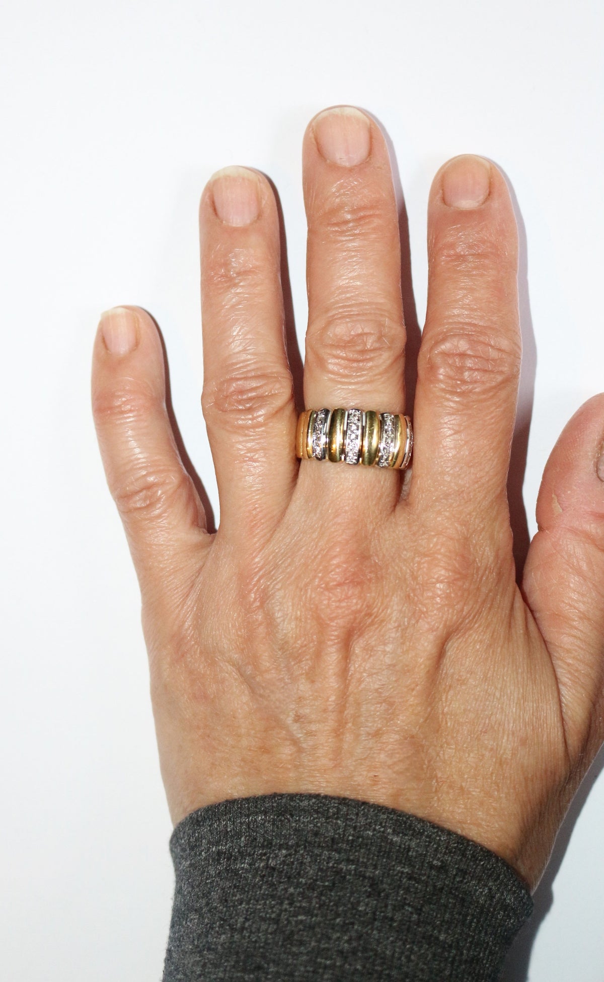 Two-tone gold and diamond gadrooned band ring