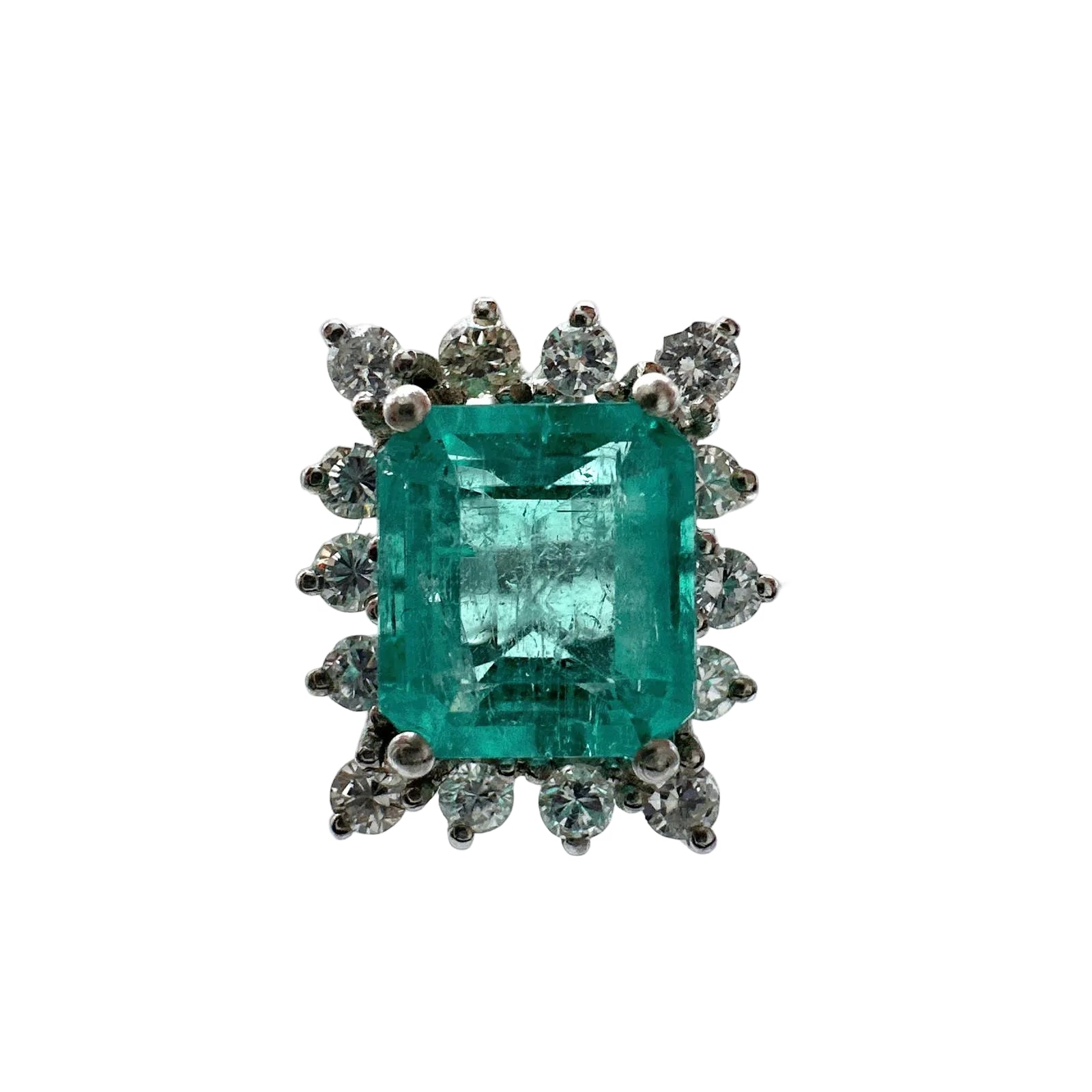 Bague en or blanc et émeraude