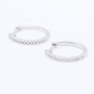 Boucles d'oreilles en or blanc et diamants d'occasion