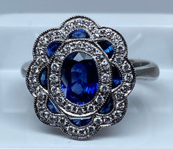 Bague marguerite en or 18 carats en saphirs et diamants