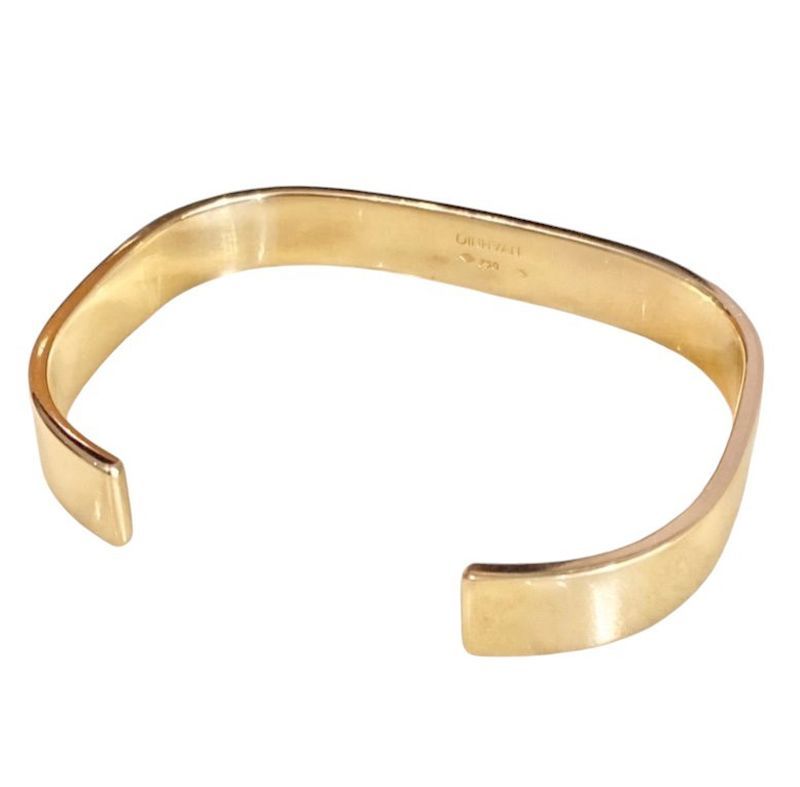 DINH VAN Signed bangle bracelet in 18k yellow gold