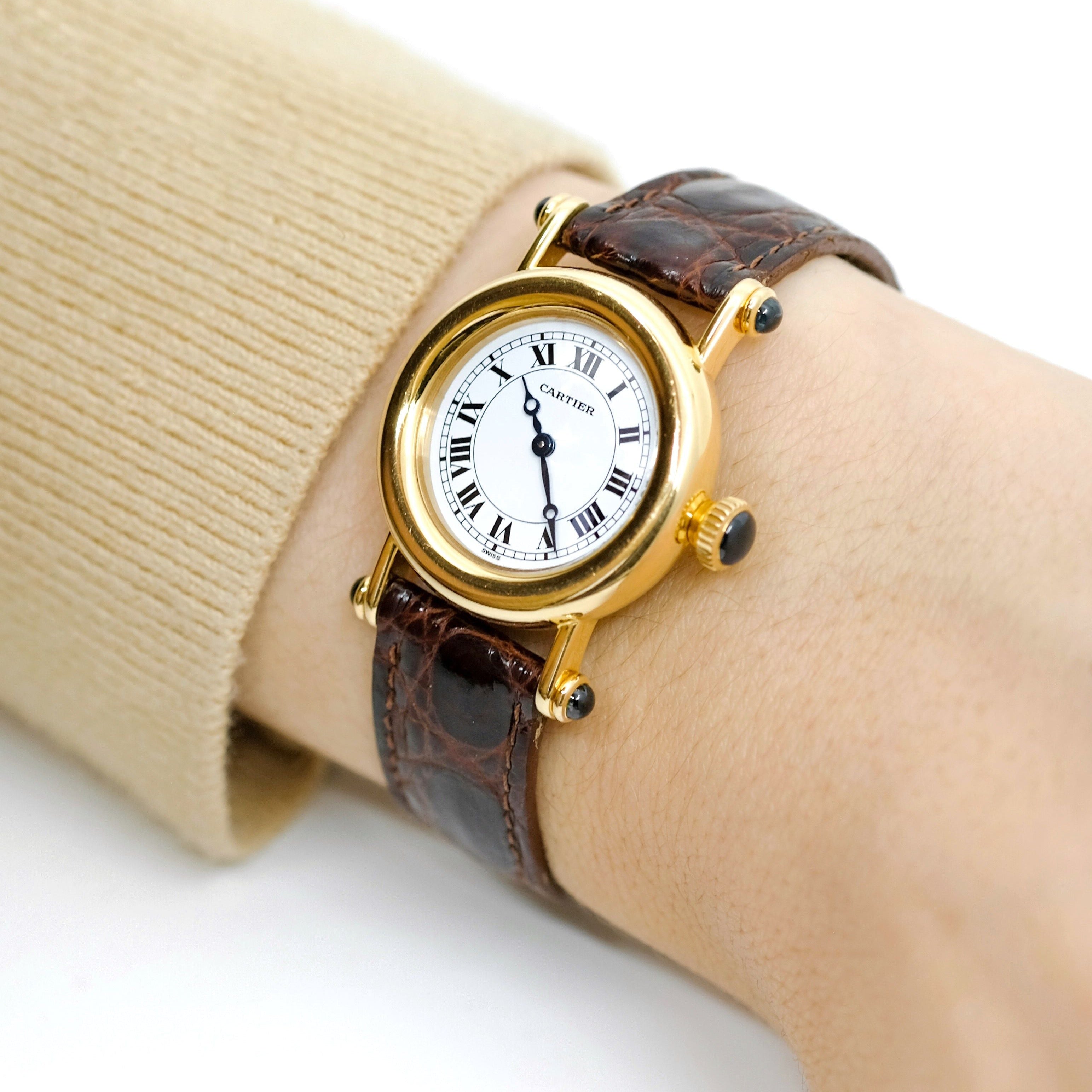 Montre CARTIER Diabolo en or jaune et saphir