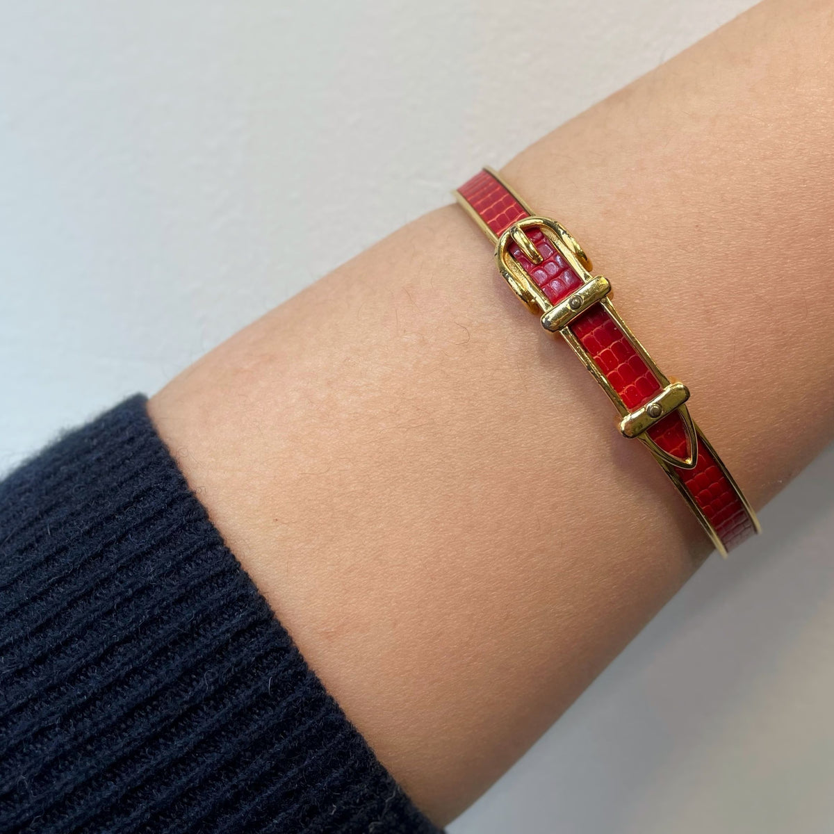 HERMÈS bracelets, gold-plated and leather belt buckle