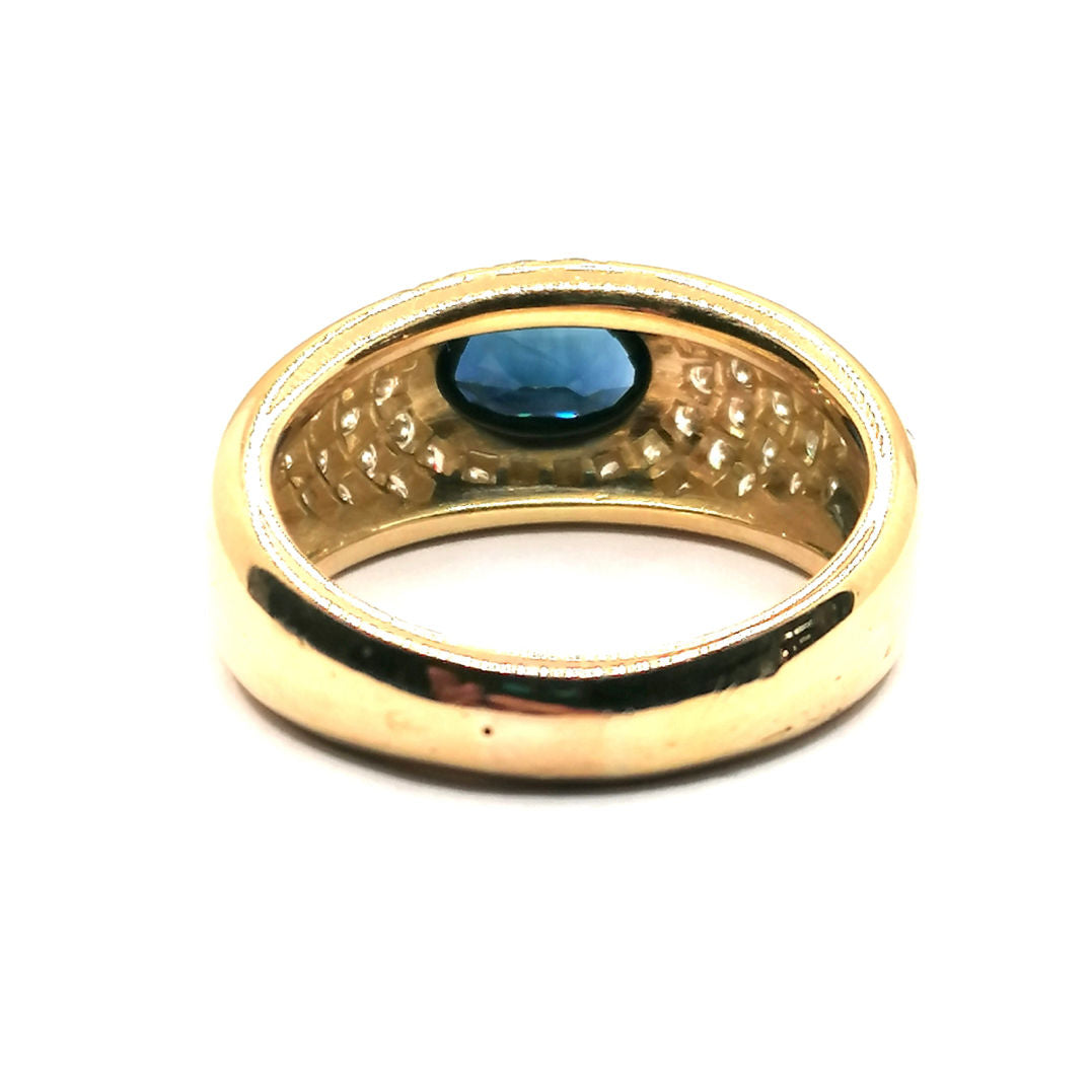 Yellow gold sapphire and diamond ring 