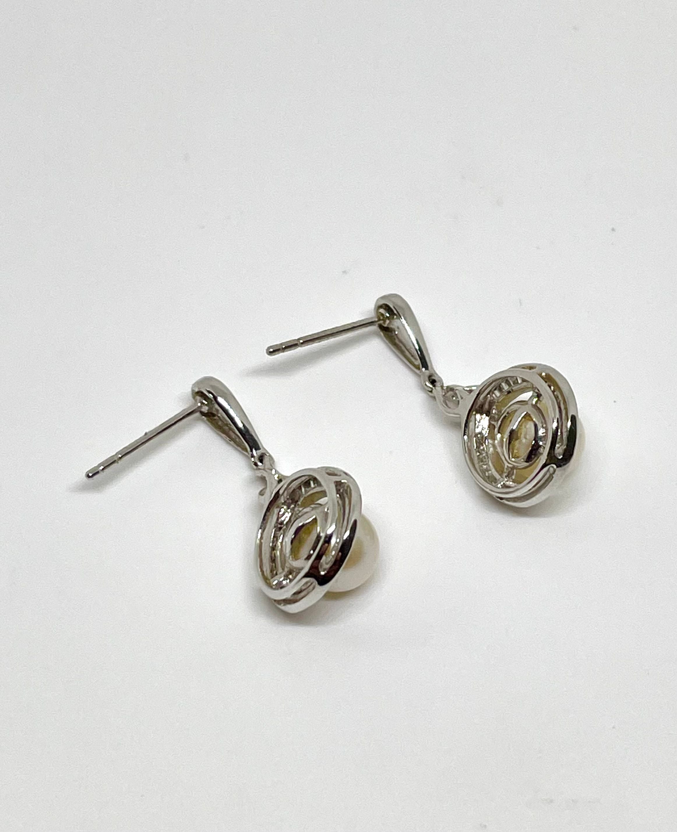 Boucles d’oreilles or blanc perles et diamants