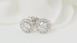 Boucles d'oreilles marguerite en or blanc et diamants