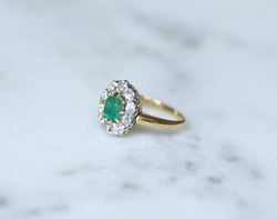 Bague marguerite ancienne en or jaune et argent avec émeraude et diamants