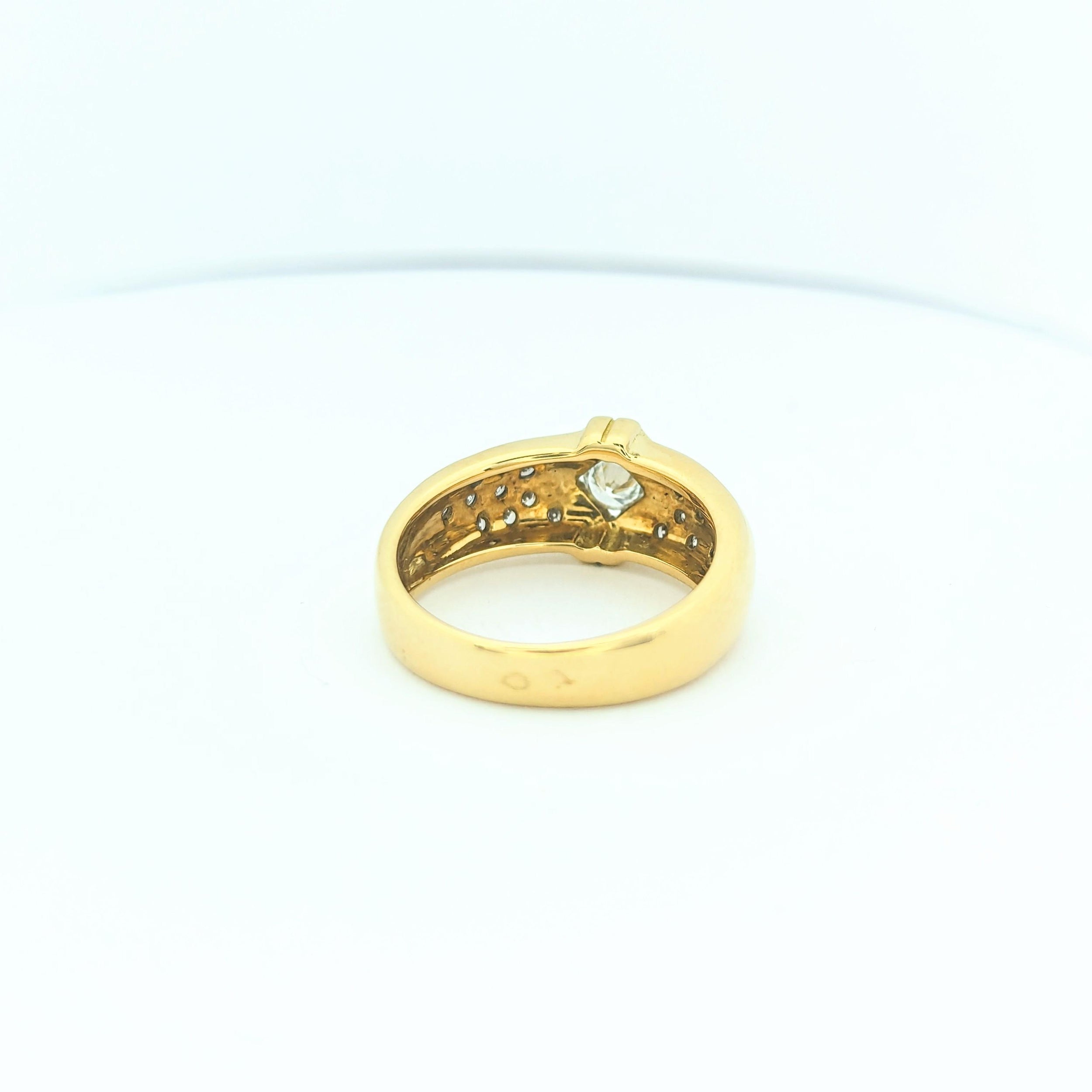 Yellow gold and diamond ring