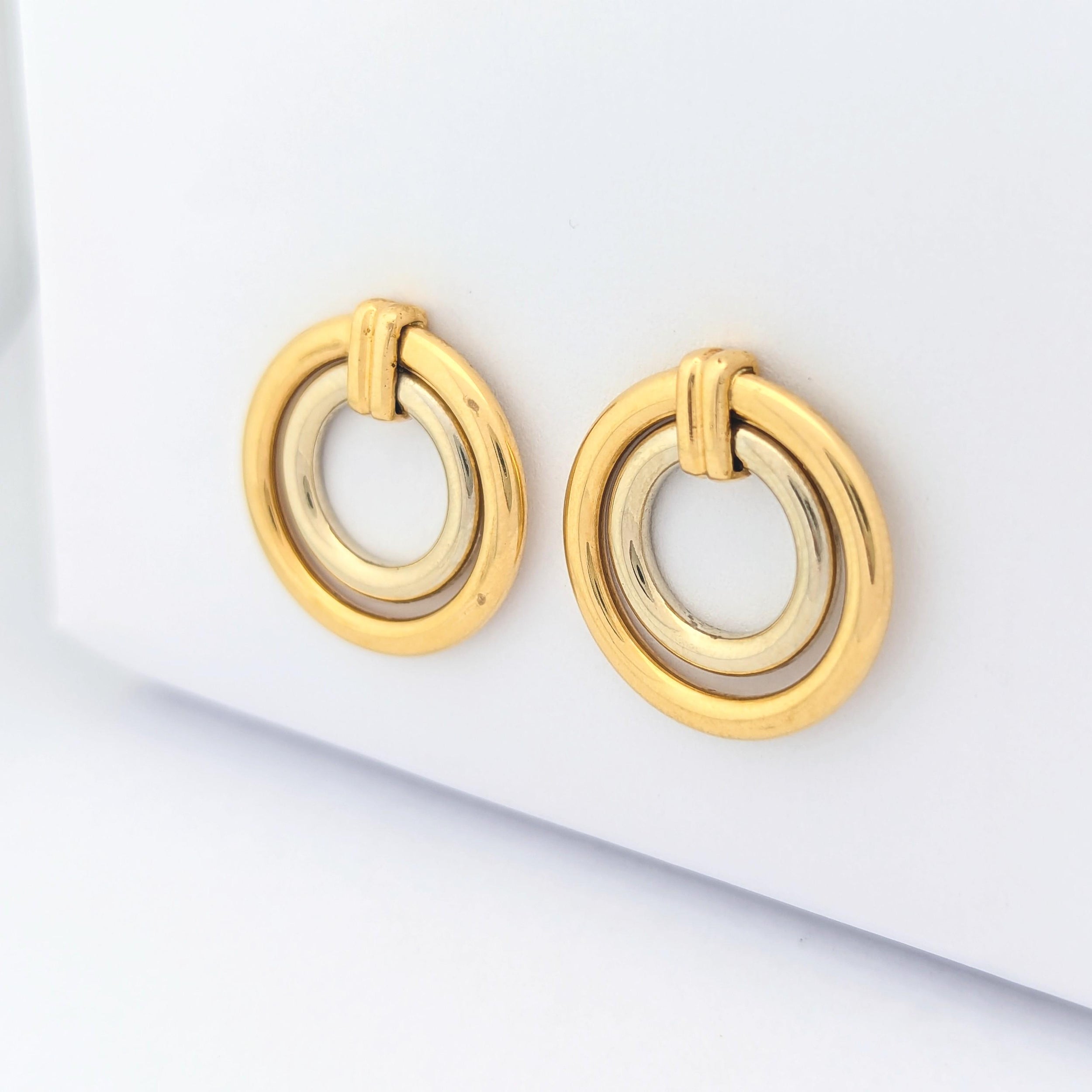 Earrings in yellow and white gold