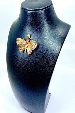 Pendentif papillon en or jaune 18 carats et pierres précieuses