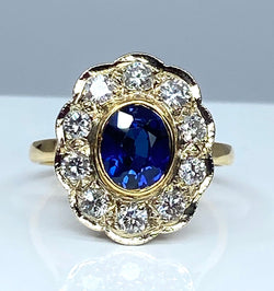 Bague marguerite en or 18 carats en saphir et diamants