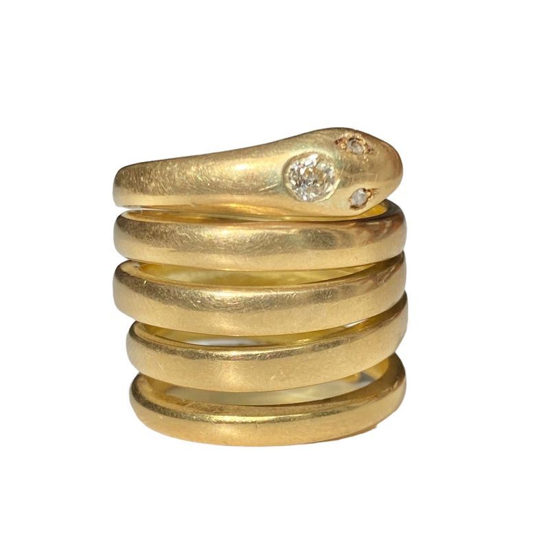 Bague composée d'un corps de serpent enroulé, en or jaune 18k