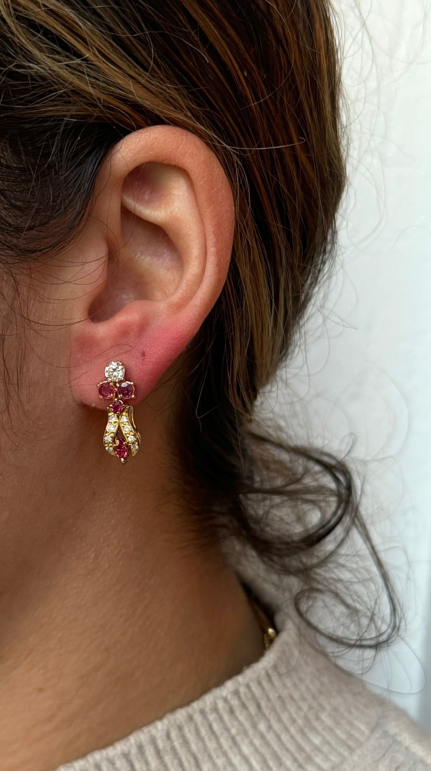 A Pair Of Gold, Ruby And White Earrings diamonds