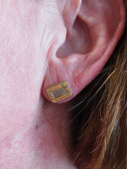 CARTIER boucles d'oreilles santos Dumont en or jaune et acier