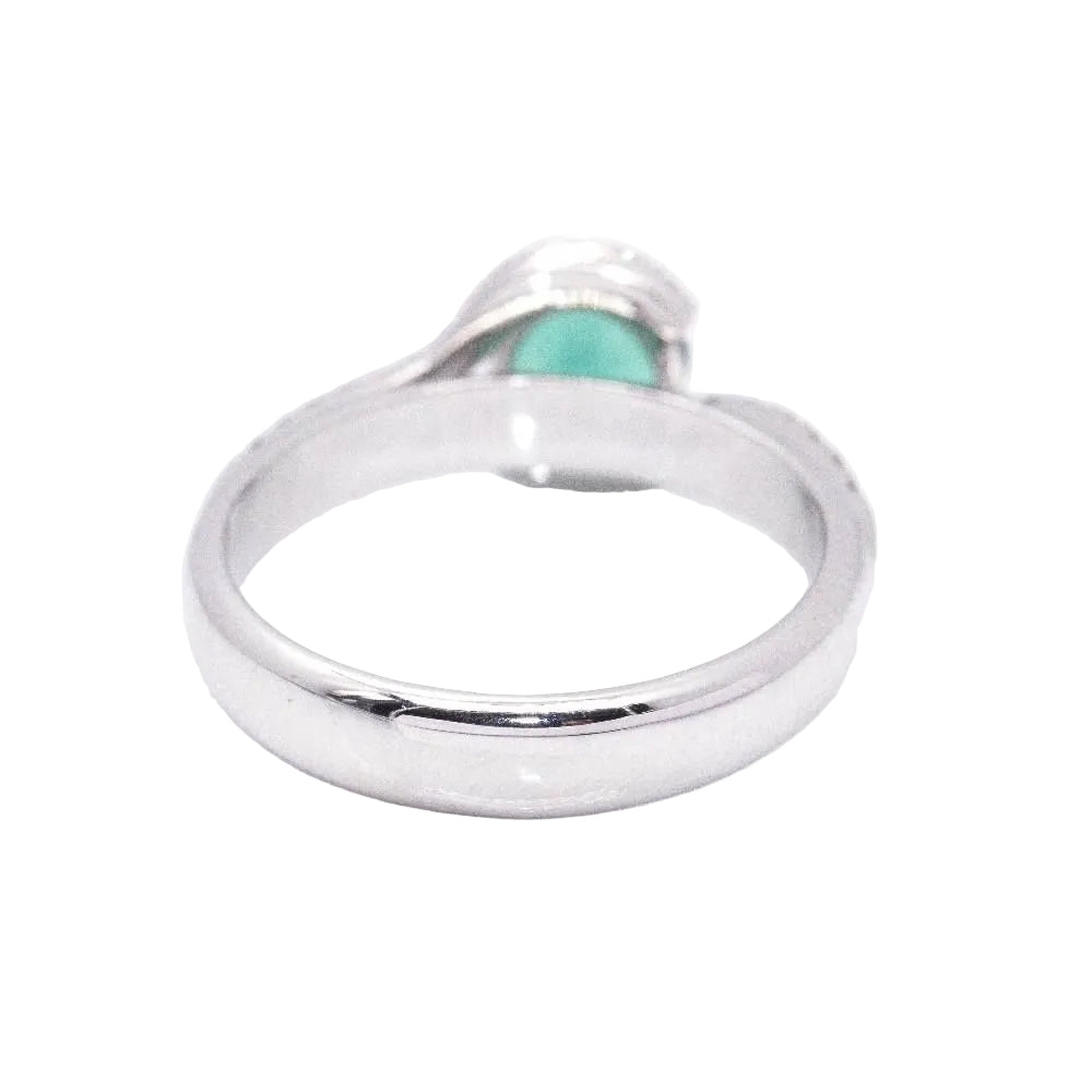White gold, emerald and diamond Solitaire Ring