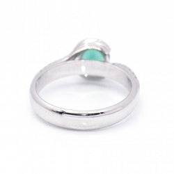 Ring at white gold, emerald and diamonds
