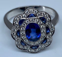 Bague marguerite en or 18 carats en saphirs et diamants
