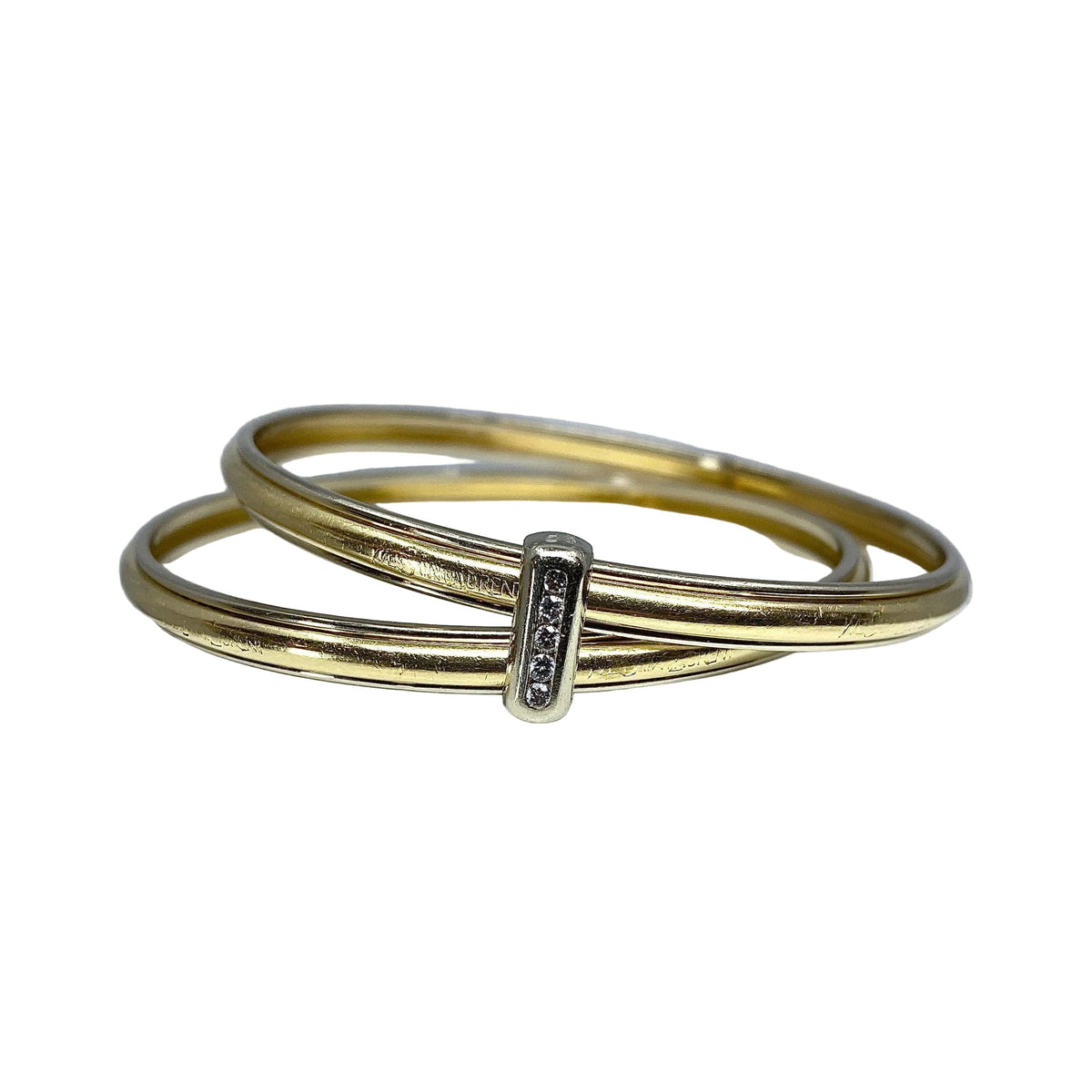 Bracelet double joncs or 18 carats, diamants, Yves Saint Laurent