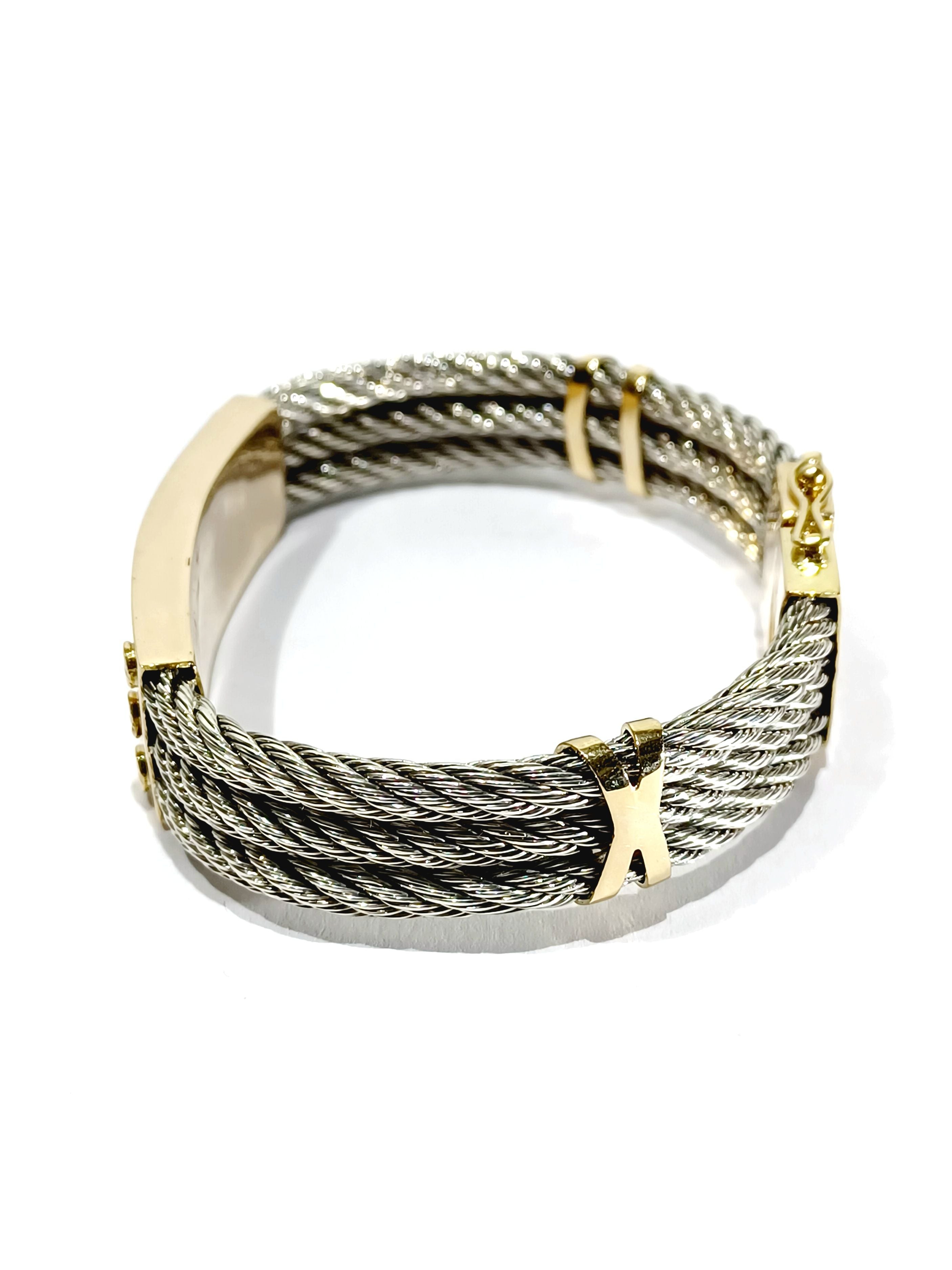 Bracelet at yellow gold and silver