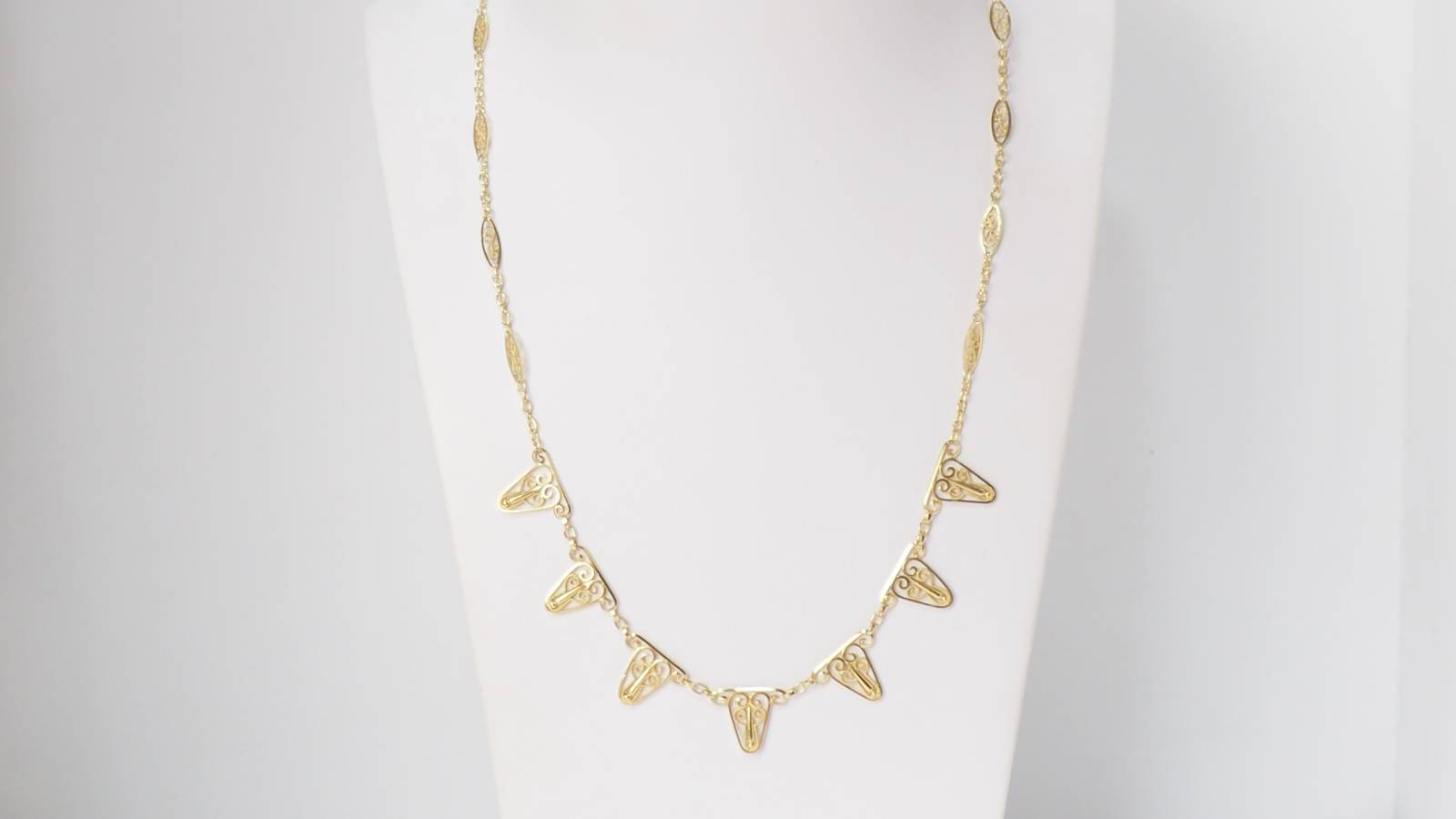 Collier draperie en or filigrané