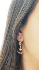 Boucles d'oreilles en or jaune et rubis