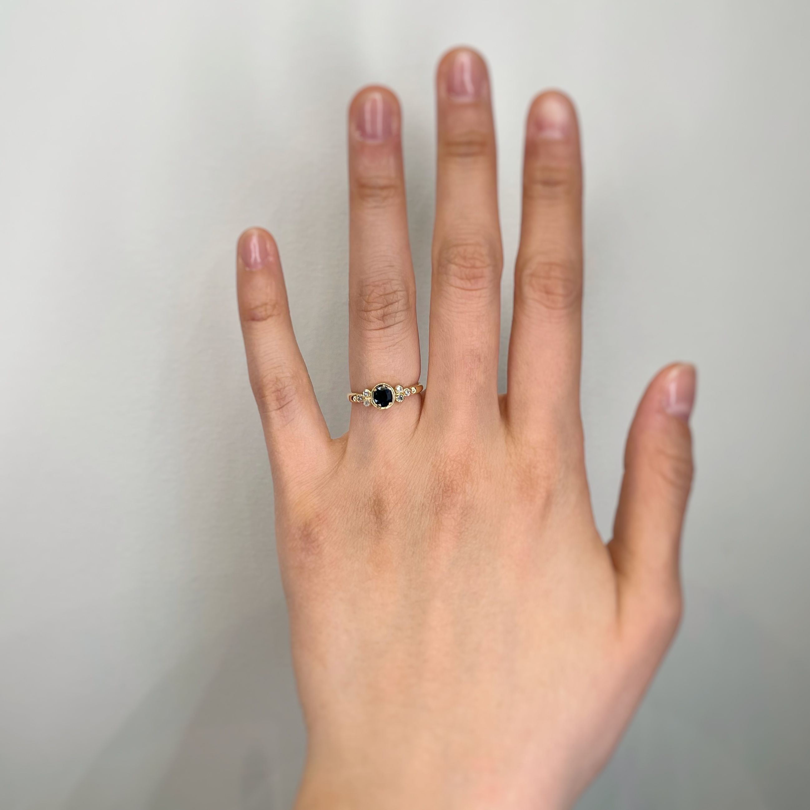 Ring Gold trilogy with diamonds and Sapphire