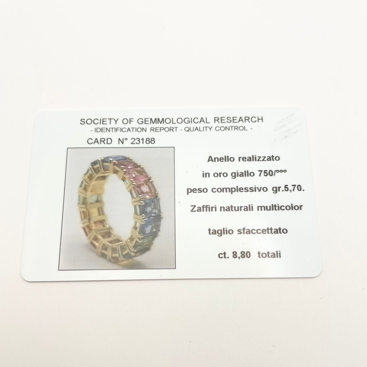 Bague null Eternè en or jaune et saphirs multicolor