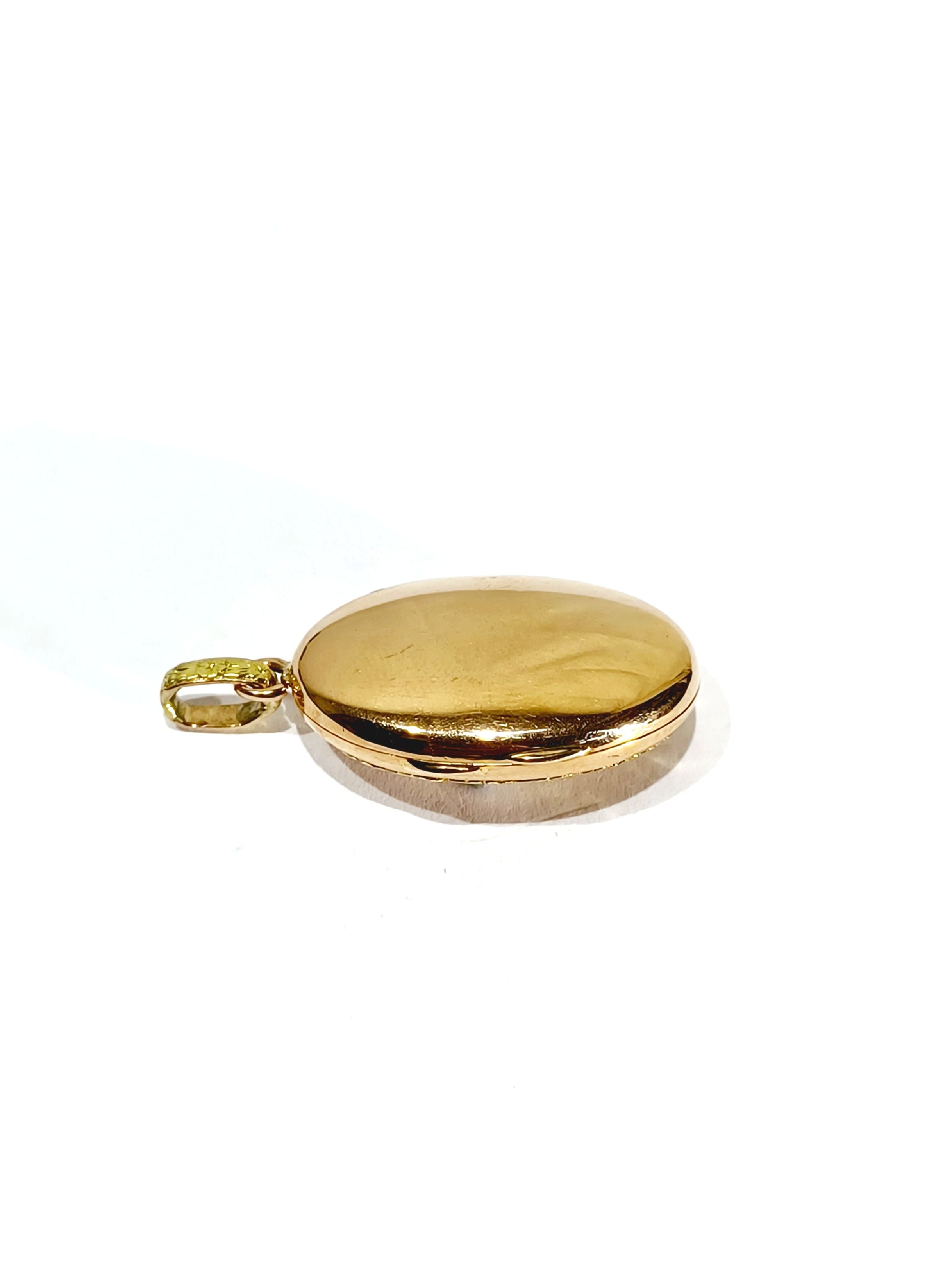 Pendant in yellow gold and rose gold