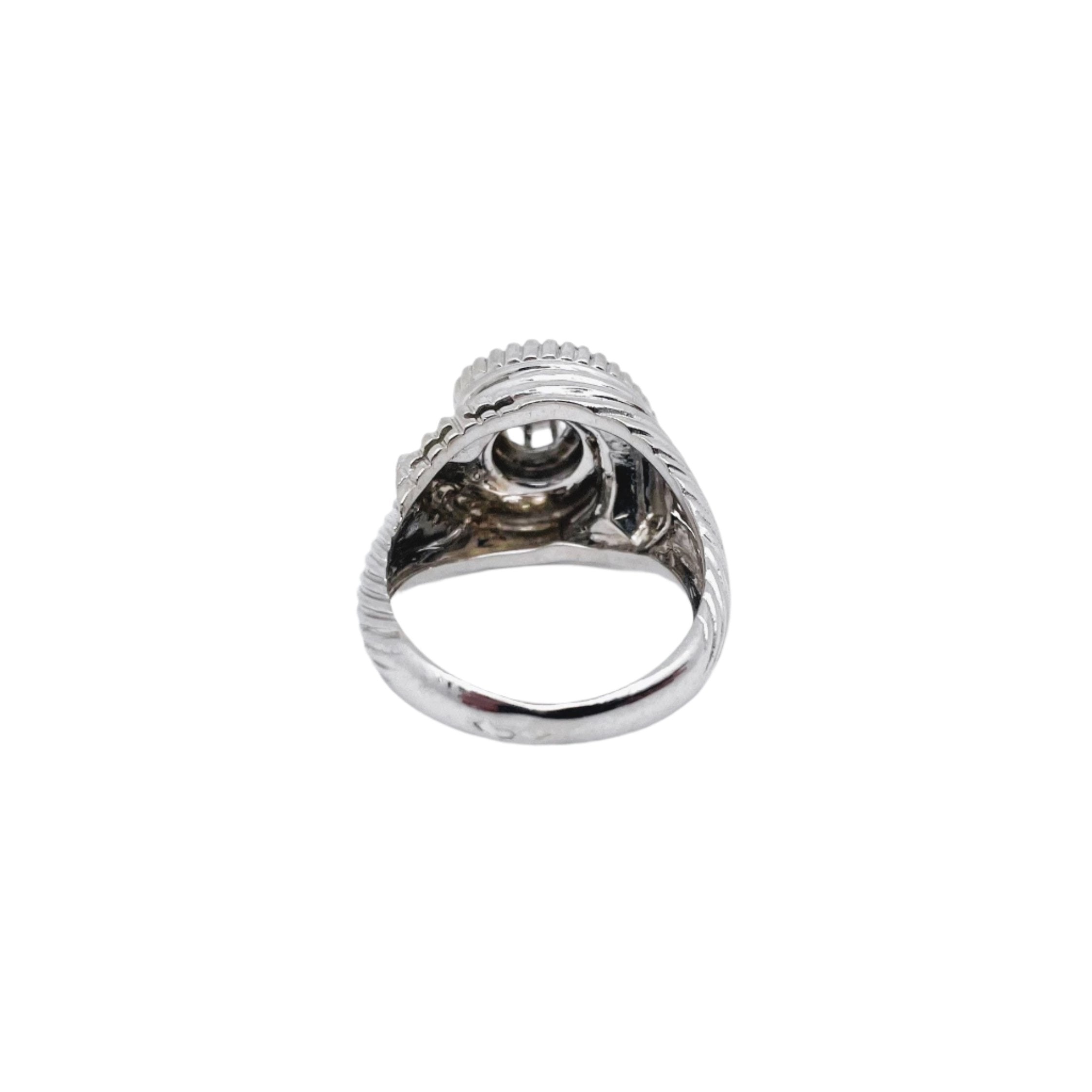 Bague Tourbillon en or blanc, platine et diamant