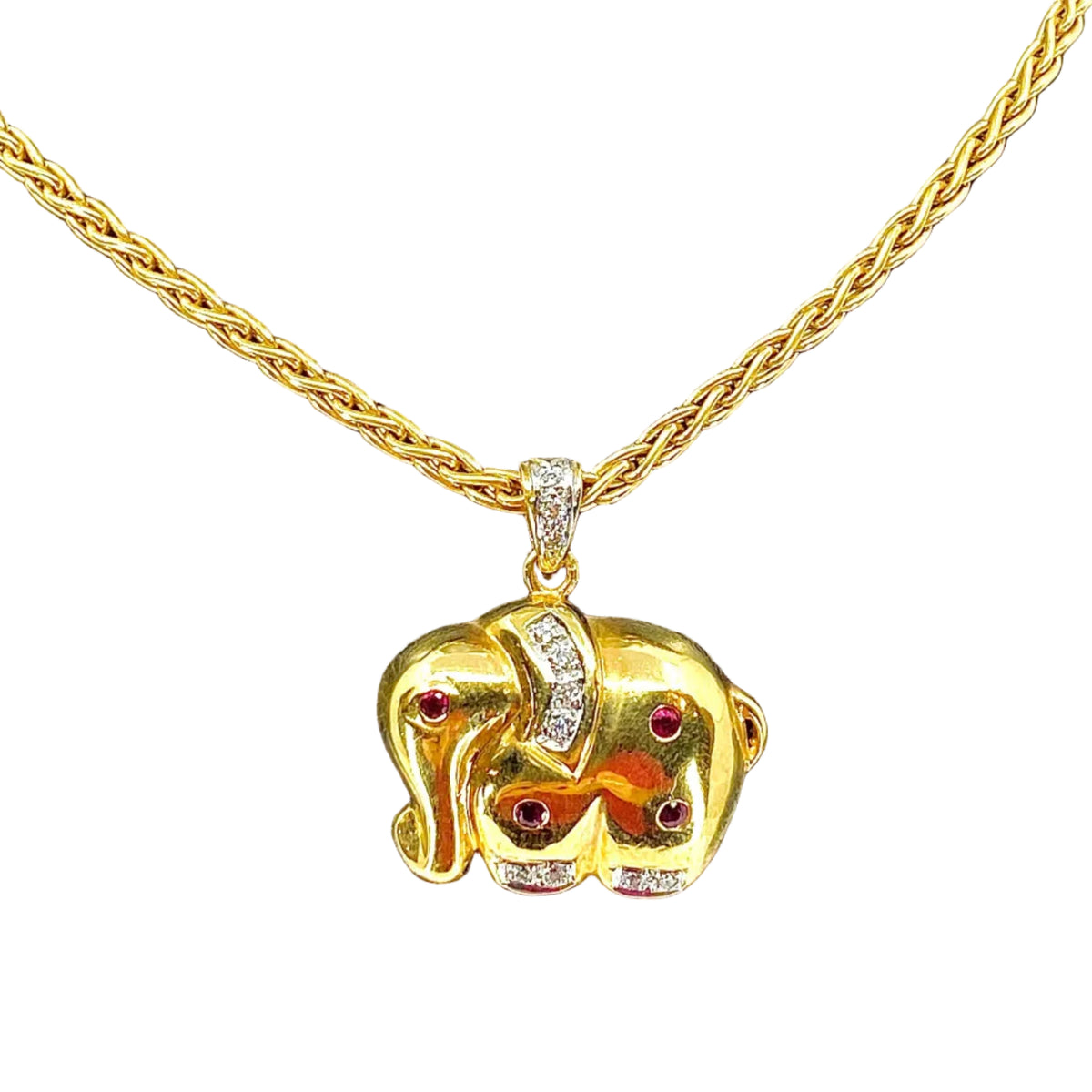 Collier pendentif en or 18 carats : éléphant en diamants et rubis