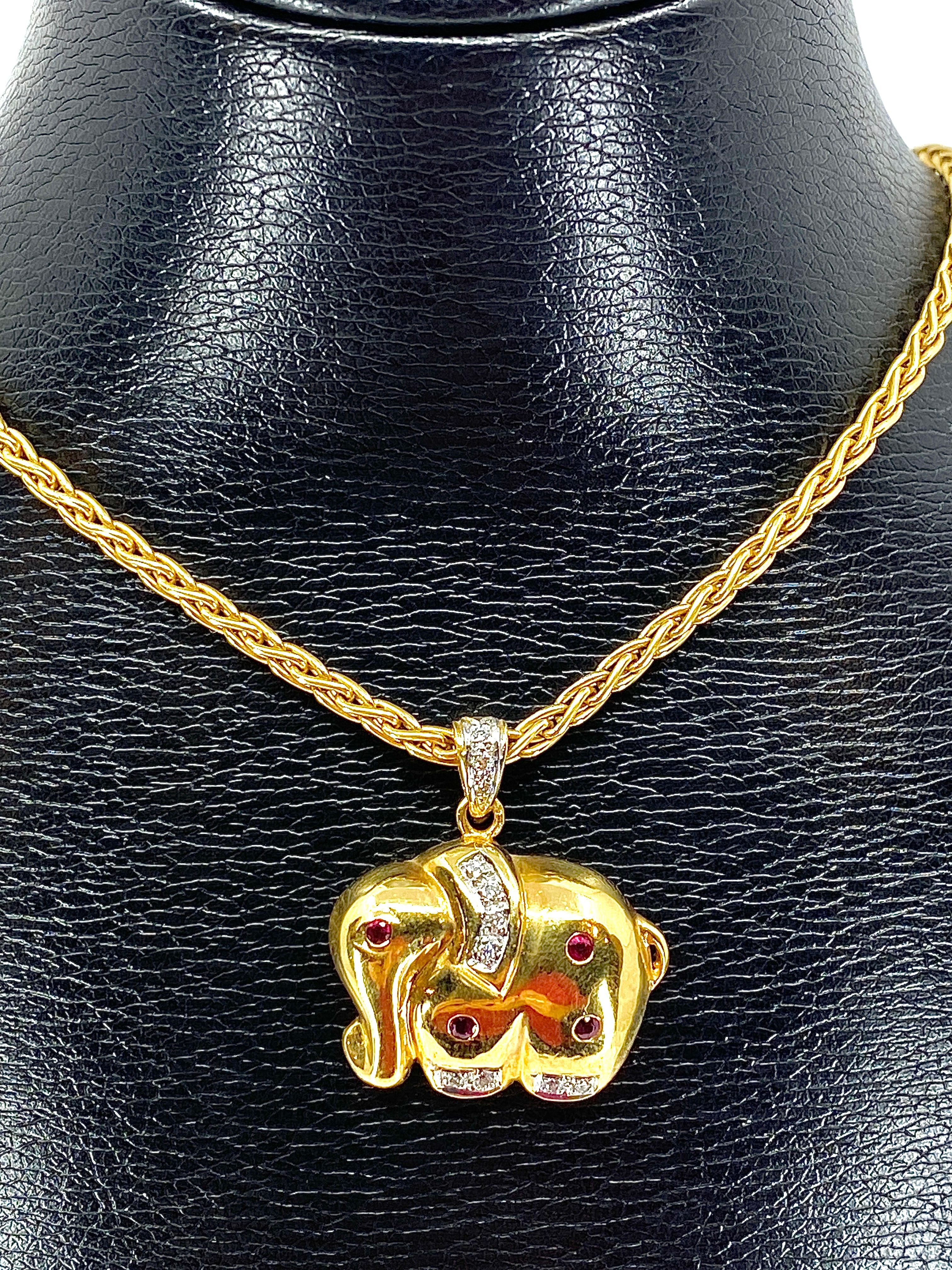 Collier pendentif en or 18 carats : éléphant en diamants et rubis