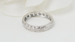 Full circle wedding ring in white gold and diamonds