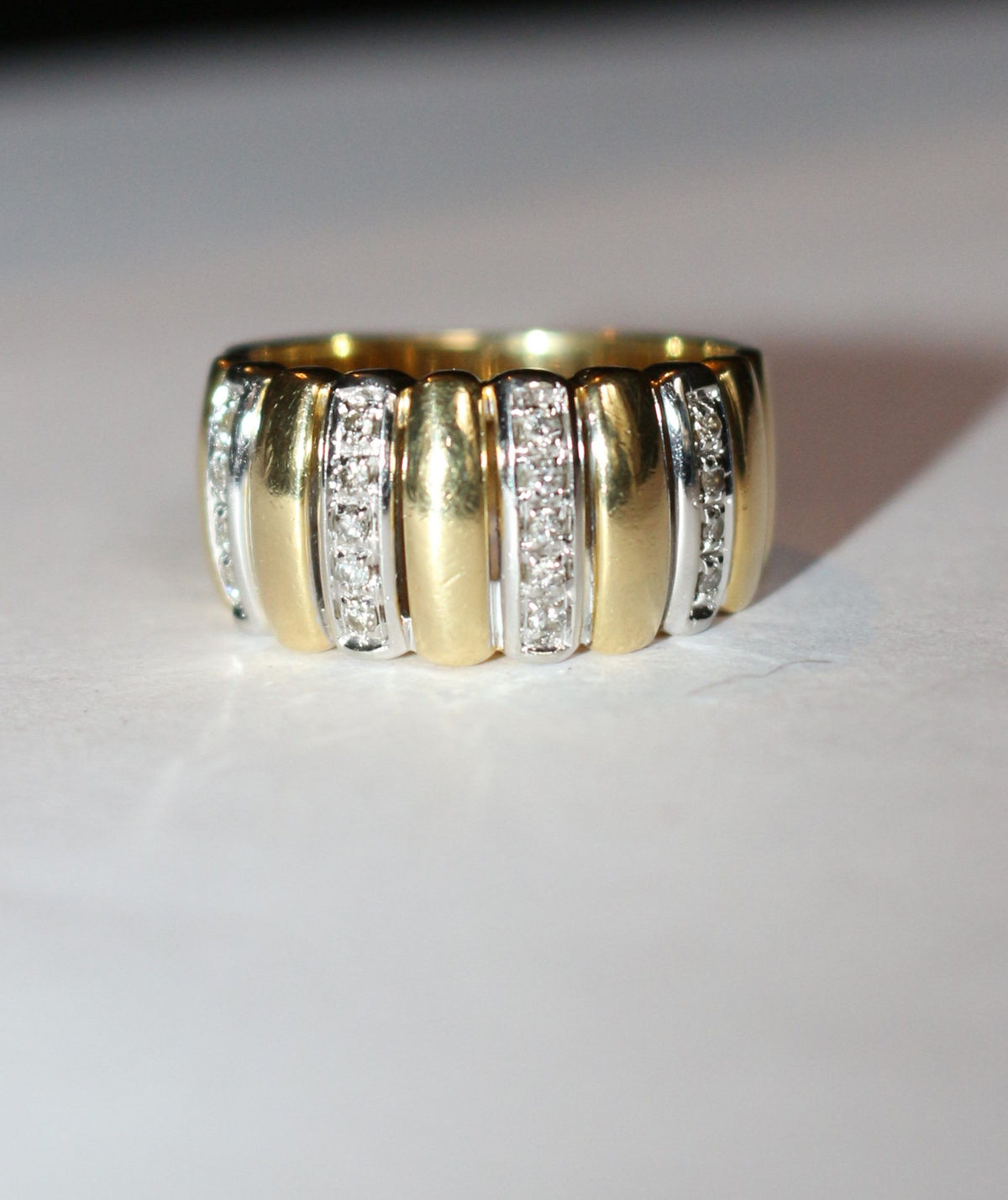 Two-tone gold and diamond gadrooned band ring
