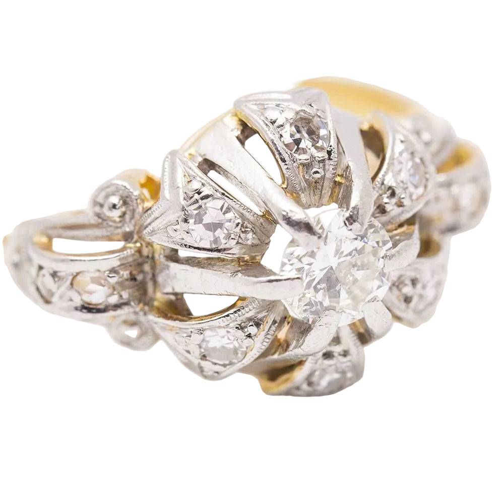Ring in yellow gold, platinum and diamonds.