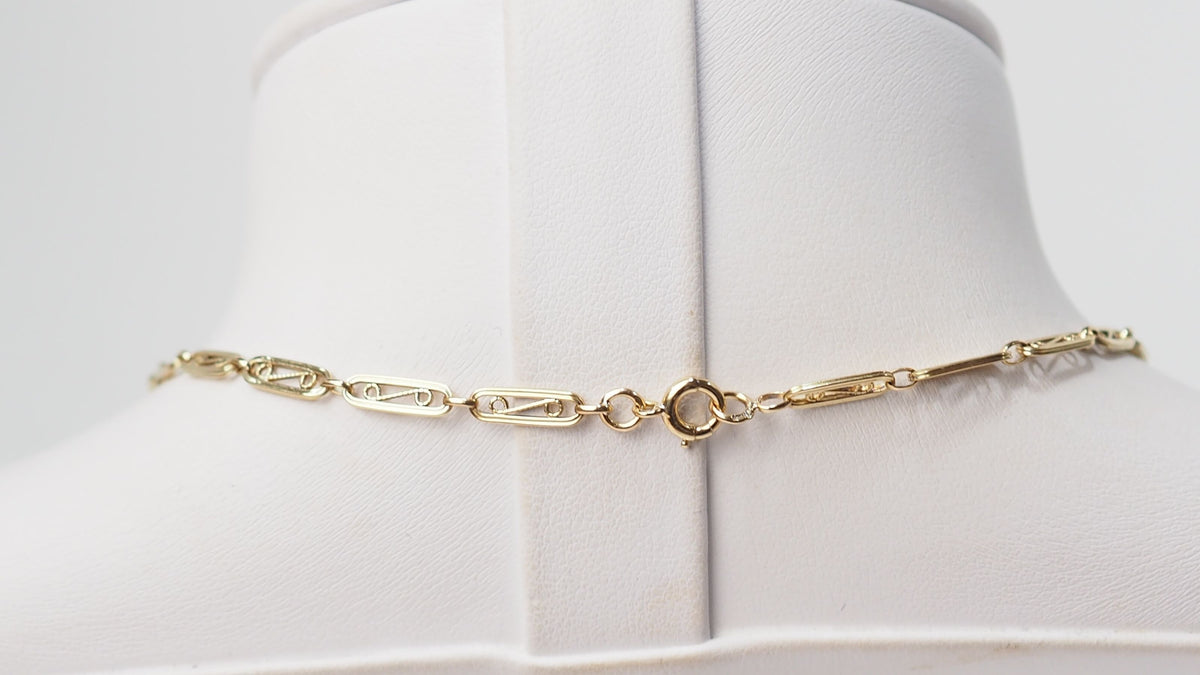 Antique drapery necklace in yellow gold