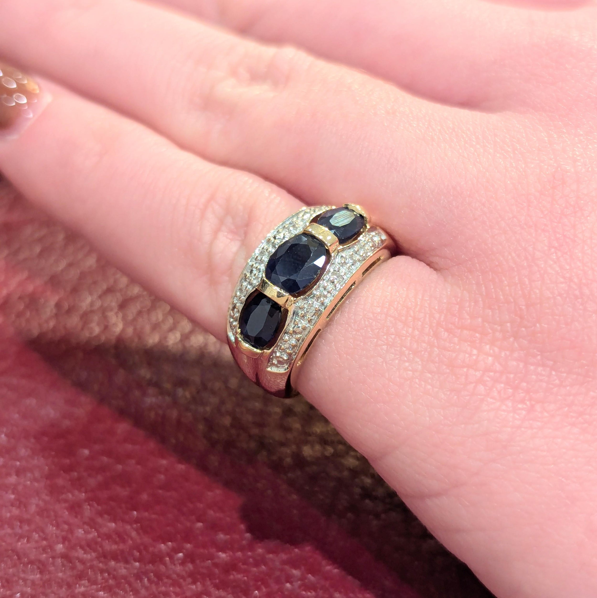 Yellow gold sapphire and diamond ring