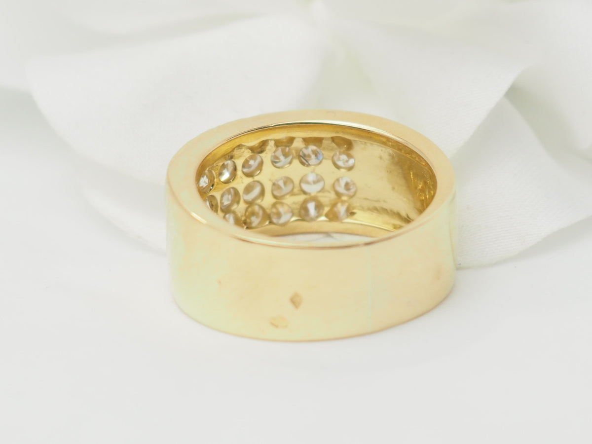 Yellow gold and diamond ribbon ring 