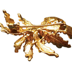 Broche florale en or jaune