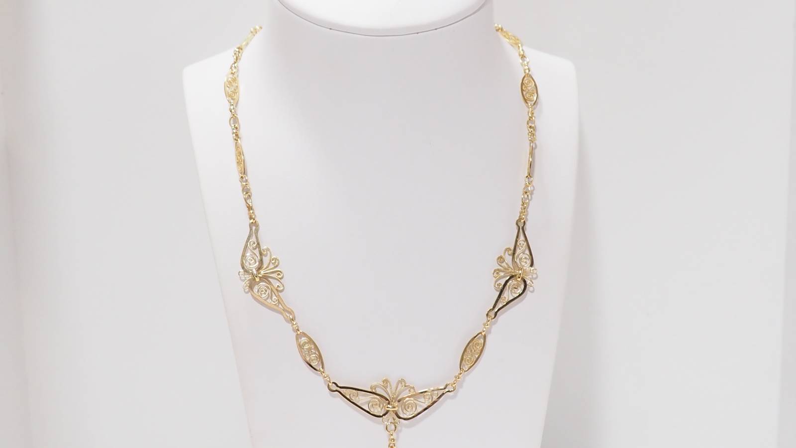 Collier draperie ancien en or jaune