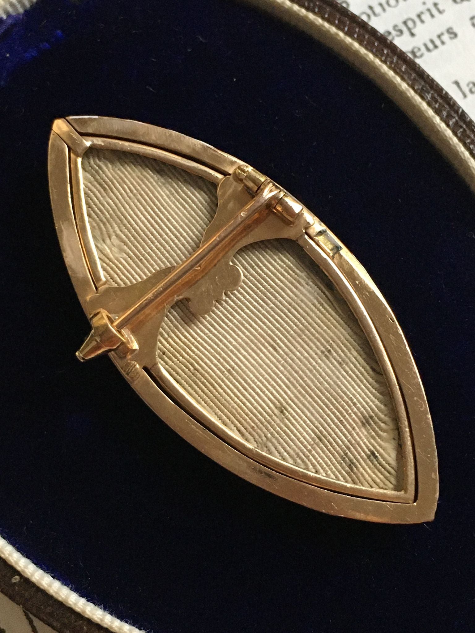 Brooch old gold shuttle and silver