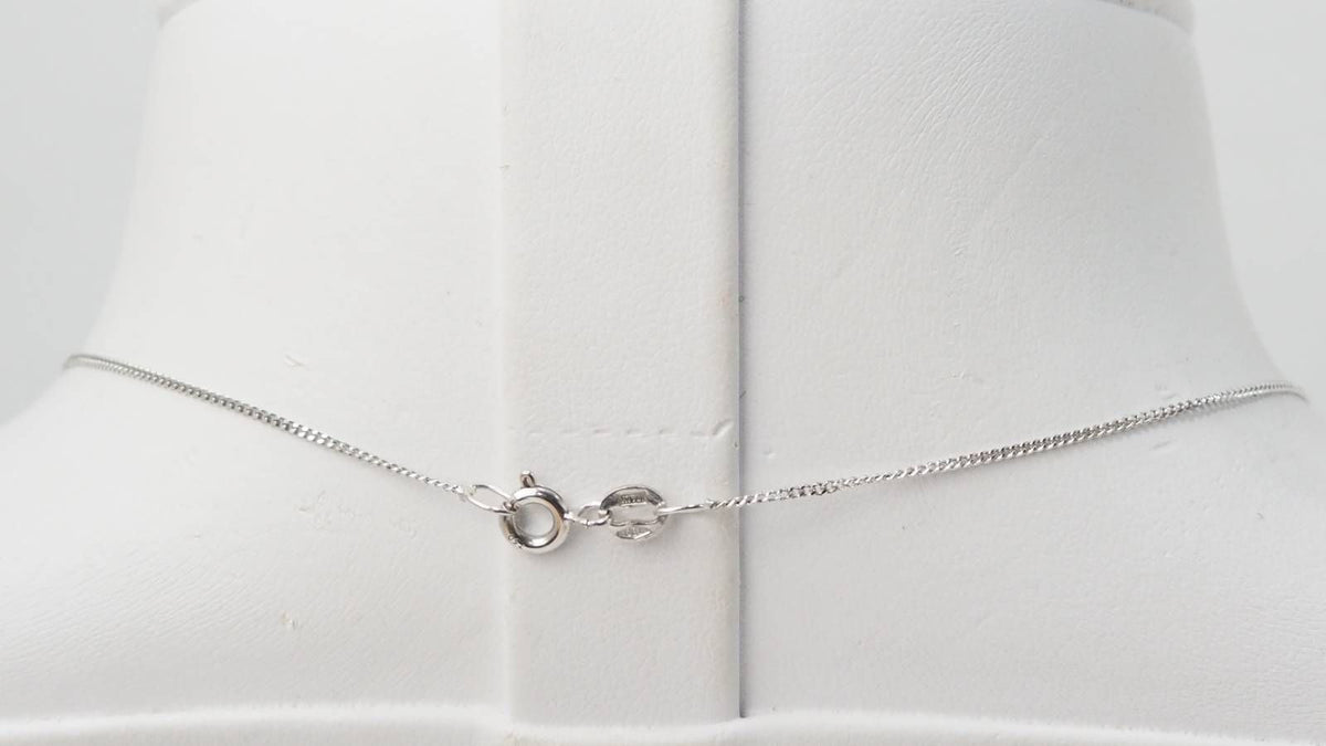 White gold, tanzanite and diamond necklace
